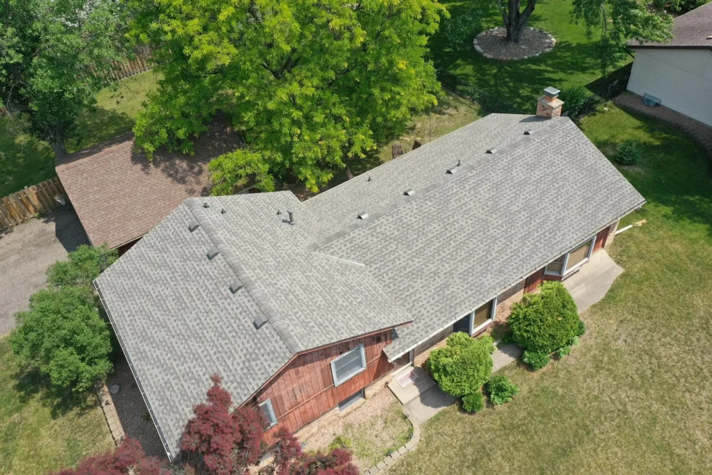 house with residential roofing completed