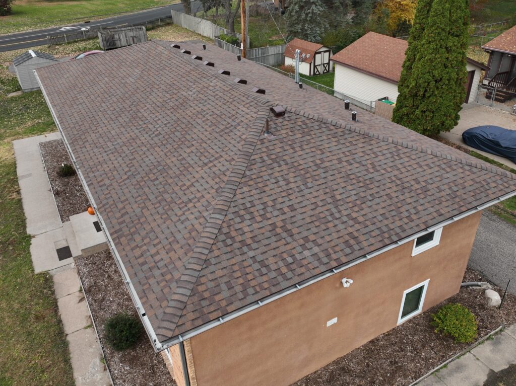 Aerial view of a house roof with Certainteed Landmark Pro Shingles in color Heather Blend